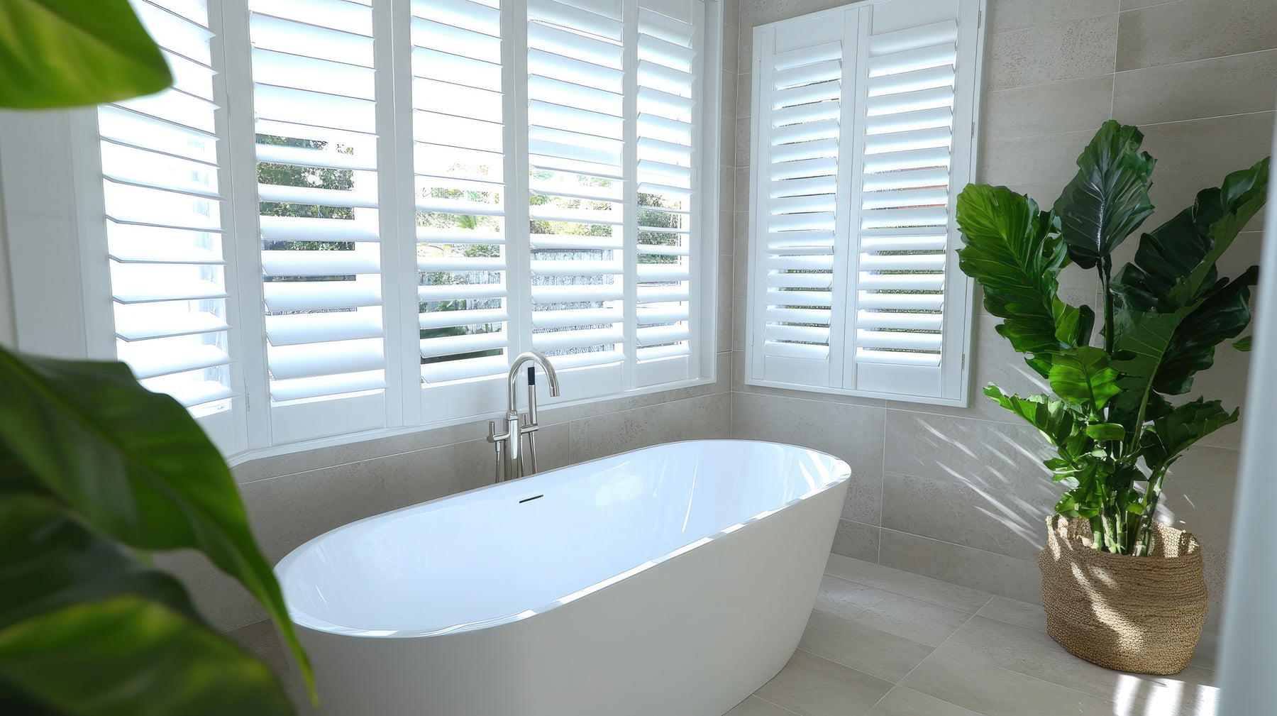 Moisture-resistant plantation shutters in a Sydney bathroom